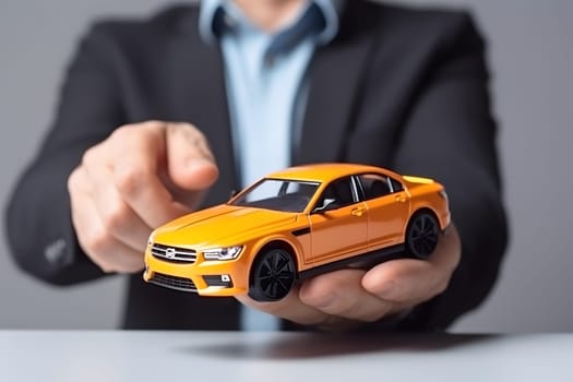 Insurance concept. Businessman with holding yellow car model. Neural network generated picture. Digitally generated image. Not based on any actual person, scene or pattern.