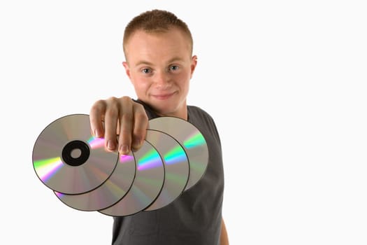A young man with blank CDs in his hand