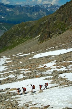 crossing a snowfield,Alps