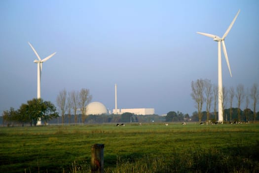 Wind turbines in front of Unterweser nuclear power plant