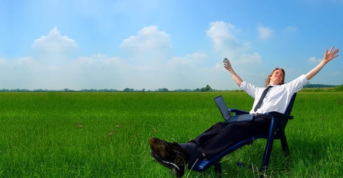 Businessman in deckchair