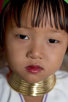 Portrait of a long-necked child