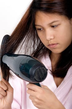 Girl blow-drying her hair