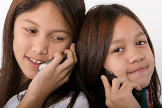 Children talking on the phone