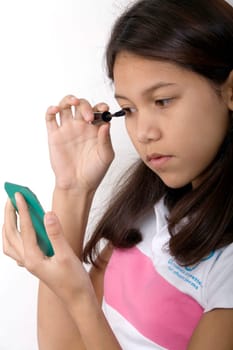Teenage girl doing make-up