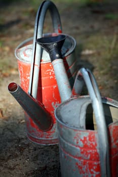 Tin watering cans