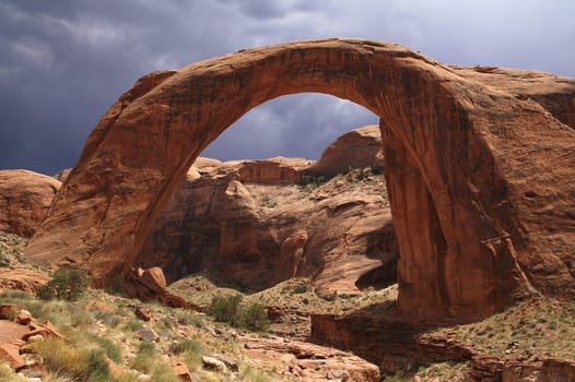 The Rainbow Bridge is the destination of a half-day cruise on Lake Powell in Page,Arizona. It is about 100 meters high and has a wingspan of about 84 meters.