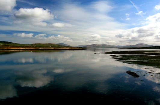 The waterway between Valencia Island and the Iveragh Peninsula on a windless morning (County Kerry,Ireland).