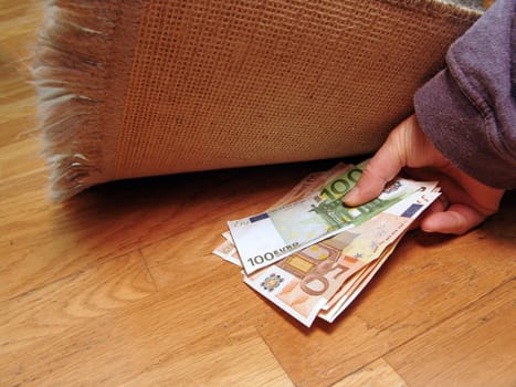 Money under carpet