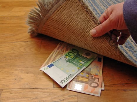 Money under carpet