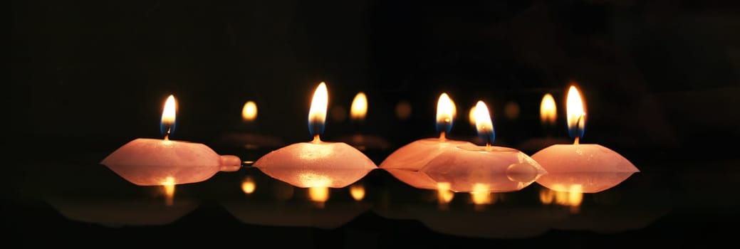 Candles in the water