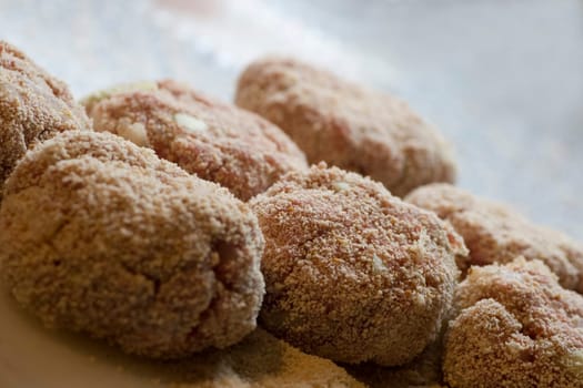 Fresh,raw meatballs