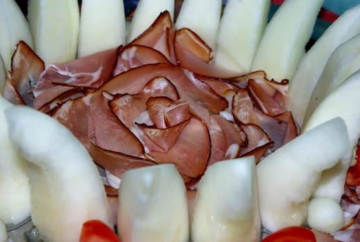 Ham on melon strips