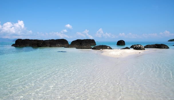 The water around Kho Kham is so clear that you could almost do without diving goggles....