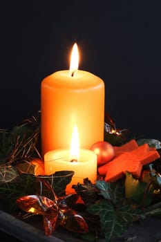 two orange candles