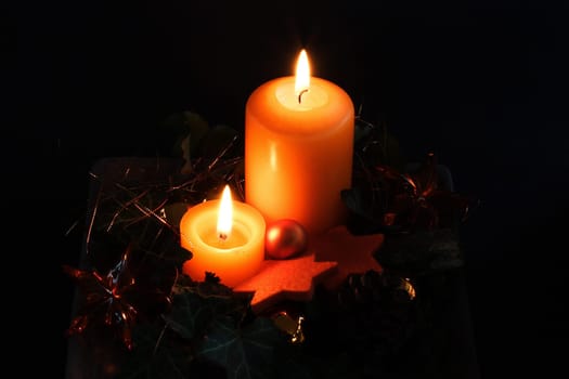 two orange candles