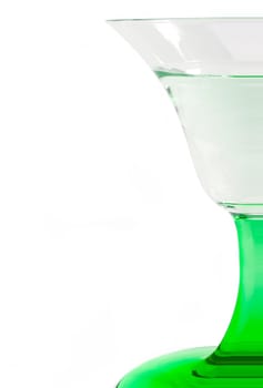 Wine glass with green stem.