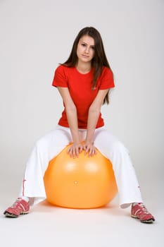 Young woman with exercise ball 1