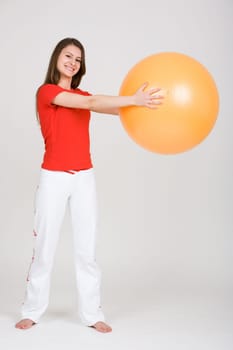Young woman with exercise ball 9