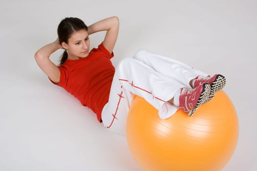 Young woman with exercise ball 4