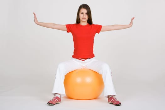 Young woman with exercise ball 7