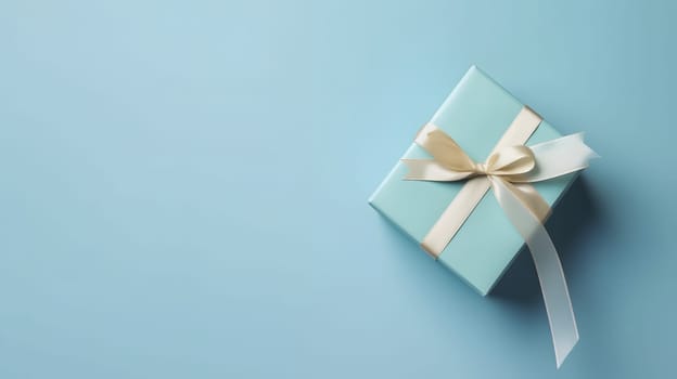 One gift box in craft wrapping paper and white satin ribbon with bow on light blue clean flat surface background. Neural network generated in May 2023. Not based on any actual person, scene or pattern.