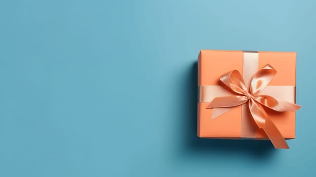 One gift box in craft wrapping paper and satin ribbon with bow on light blue clean flat surface background. Neural network generated in May 2023. Not based on any actual person, scene or pattern.