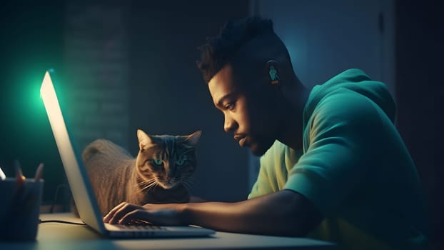 african american guy using laptop at working table with his cat at night at home office. Neural network generated in May 2023. Not based on any actual person or scene.