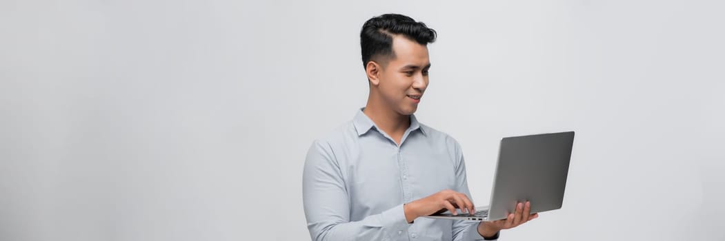 Young man use of the laptop computer