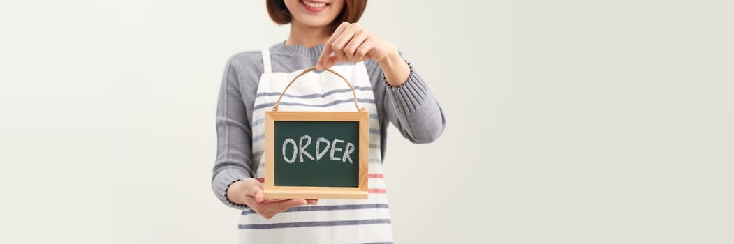 Woman hold order sign for small business on white background.