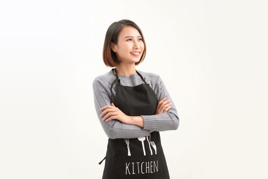 Portrait of confident asian woman barista standing on white background.