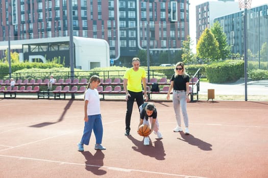 Basketball with family make me happy. High quality photo