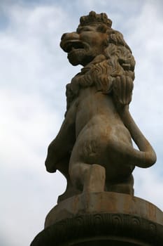 Coat of arms holding lion on a fountain in Weimar (Thuringia)