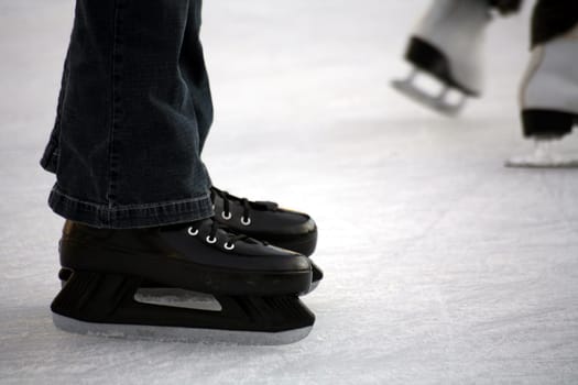 Skaters on an ice rink