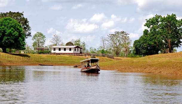 Settlement and boat in the Amazon region