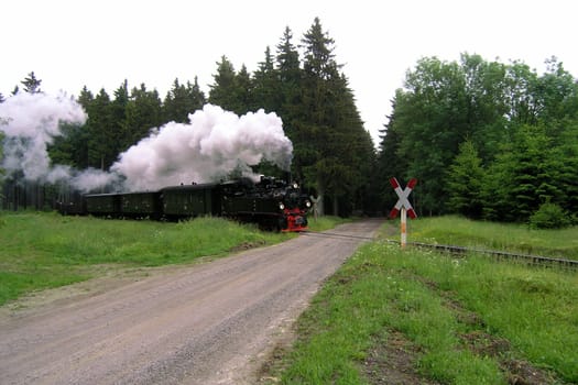 Scheinfahrt fahrt am Andreaskreuz. If you want to take pictures outdoors,sit in the back of the rail convertible. On the return journey,this open wagon is attached to the locomotive!