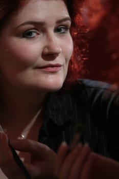 A scrutinizing look when applying make-up