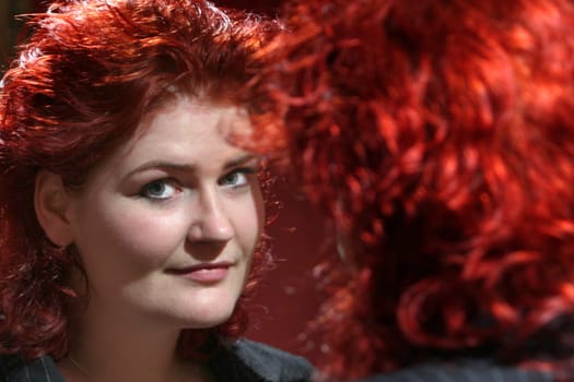 scrutinizing look in the mirror