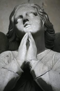 Angel figure on an old grave