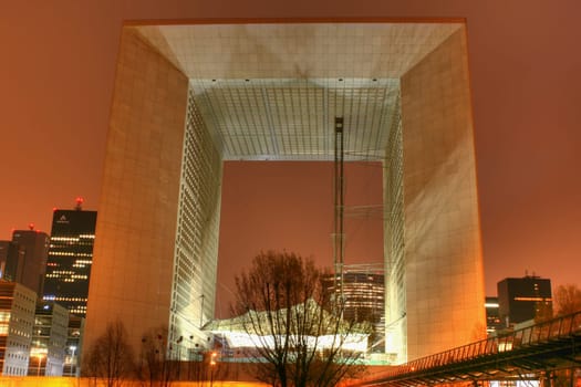 The Grande Arche (german: the great arch of the bridge) is a modern structure in the form of a triumphal arch in the Paris suburb of La Défense. This new triumphal arch officially bears the name La Grande Arche de la Fraternité,but is often used in Paris as well as L&#03