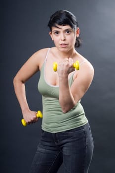 Olivera with two dumbbells