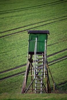 Hunter's hide in a field