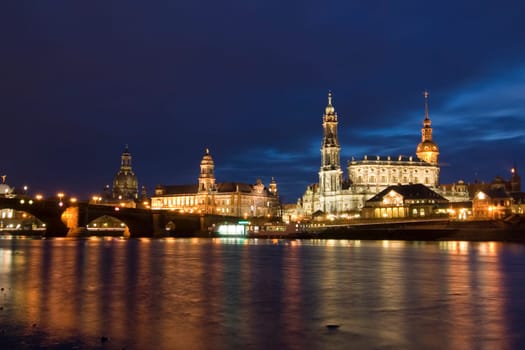 Dresden - View at the blue hour of Augustus Bridge,Higher Regional Court,Hofkirche,Residenzschloss alte Wache and Theaterkahn