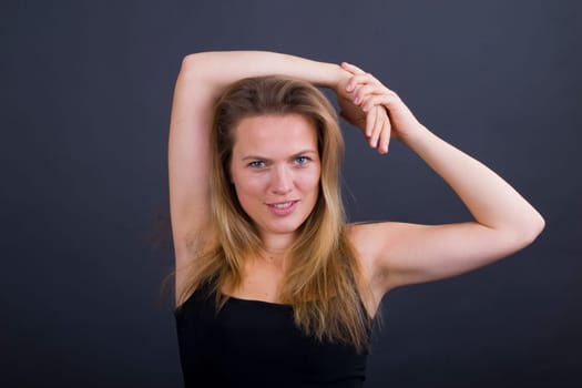 Miryam arms above her head