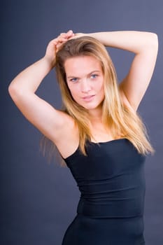 Miryam with her arms raised