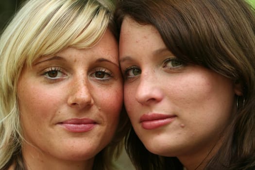 two cheerful young girlfriends