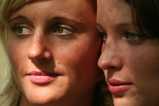 two cheerful young girlfriends
