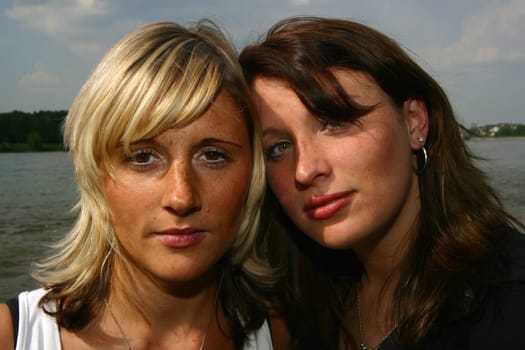 two cheerful young girlfriends