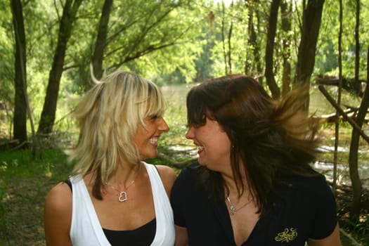 two cheerful young girlfriends