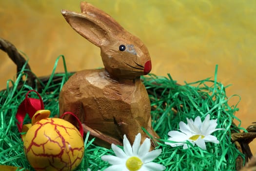 Wooden bunny in an Easter basket